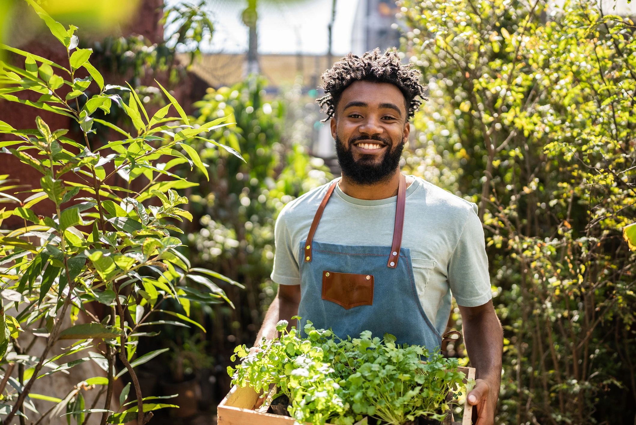 happy gardener with plants
